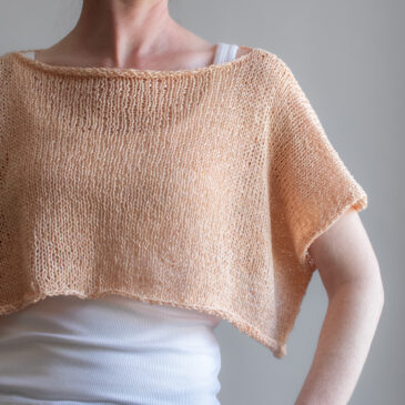 Free Beginner Knit Tee Pattern — One Rectangle, Two Seams a woman wearing a peach linen knit tee from the front, back, and sides. The boxy cropped top has short sleeves and a wide neckline.